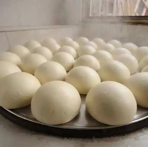  听到没,爱吃馒头的中国人有人说你们天生贫贱